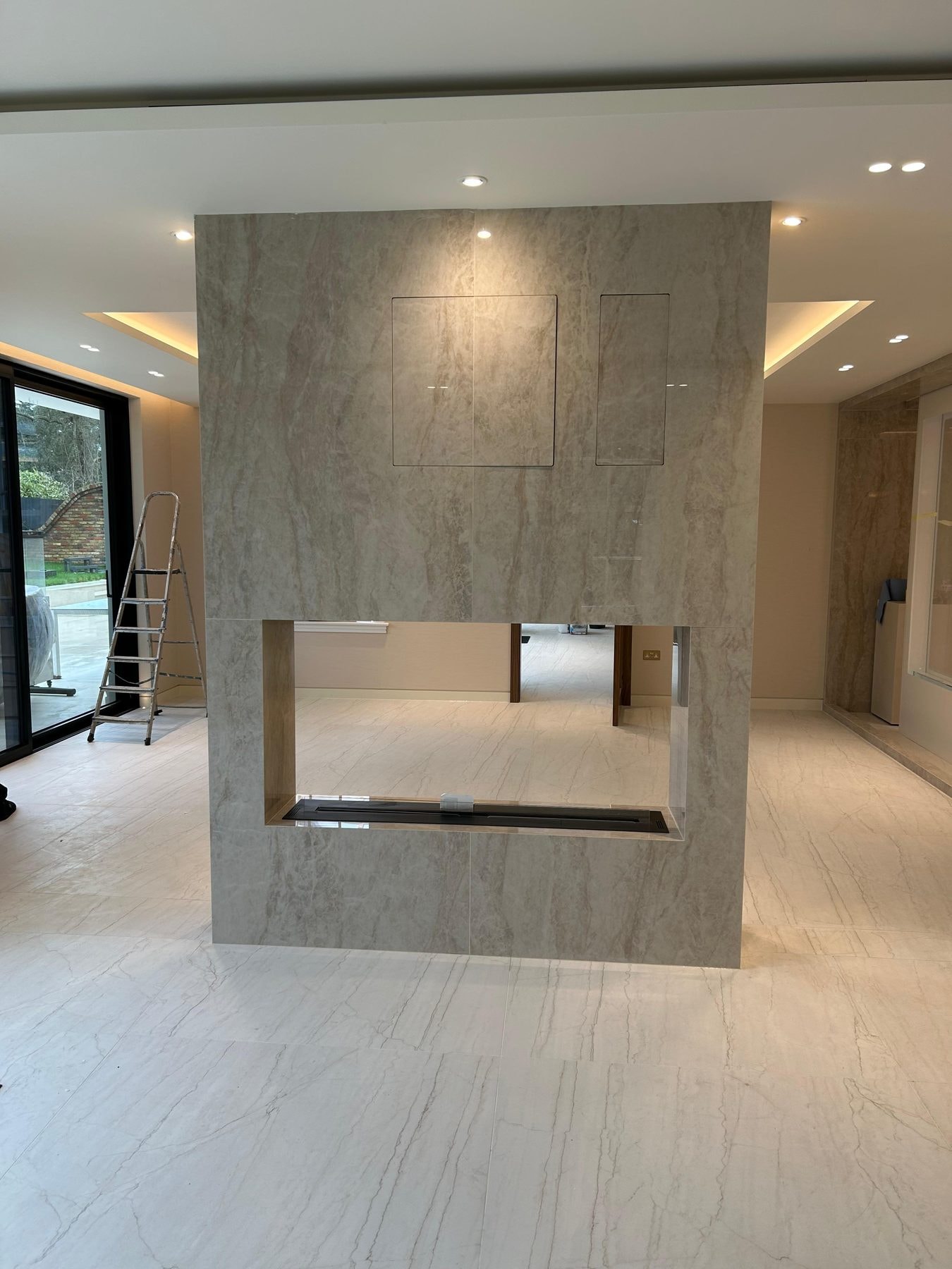 Double-sided Fireplace Wall in Dekton Arga — Dekton Arga