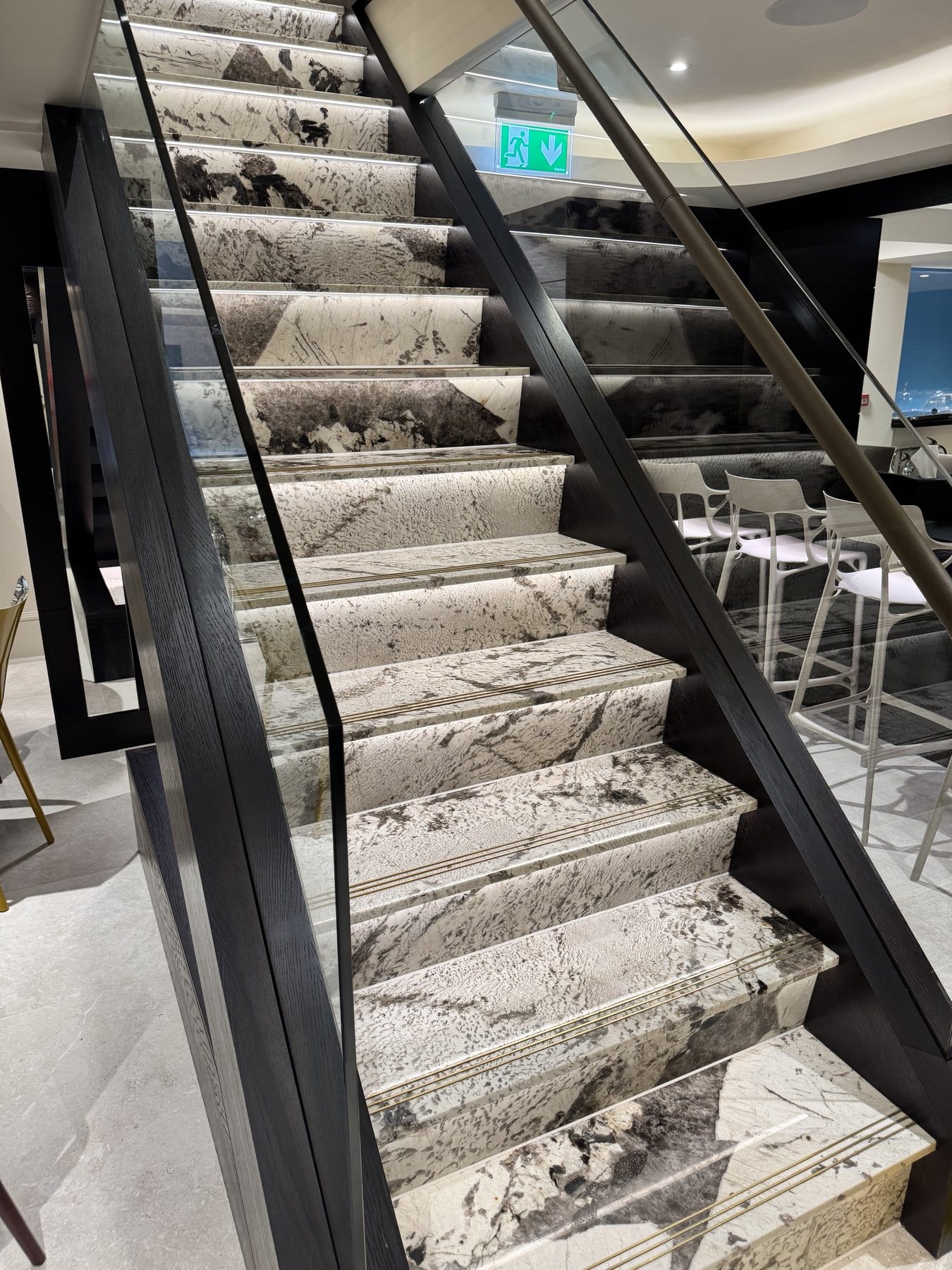Staircase & Book-matched Floor in Patagonia White — Patagonia White, polished
